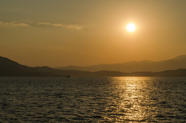 Evia island, Greece - July 01. 2020: Sunset on the island of Evia, Greece.
