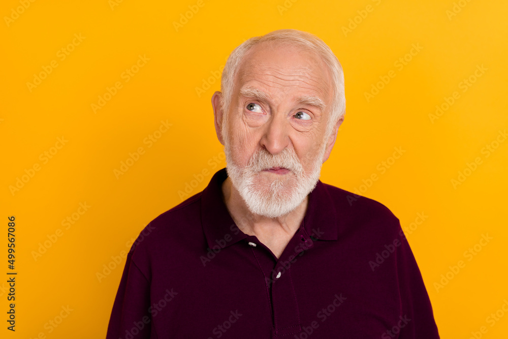 Sticker Photo of mature man look empty space hmm uncertain think ponder isolated over yellow color background