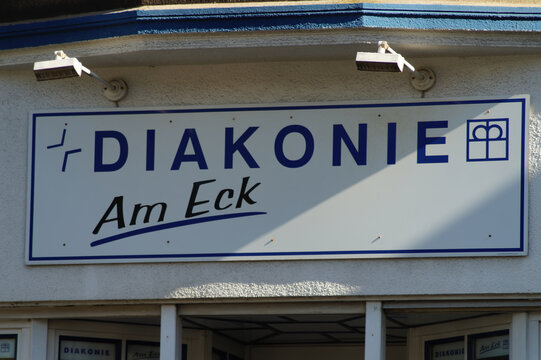 Schild "Diakonie am Eck" in der Mülheimer Altstadt