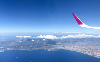 Aerial view from a plane above the Mediterranean Sea to Palma de Mallorca in summer