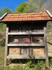 a bee and insect hotel in a countryside forest for environmental conservation and saving bees