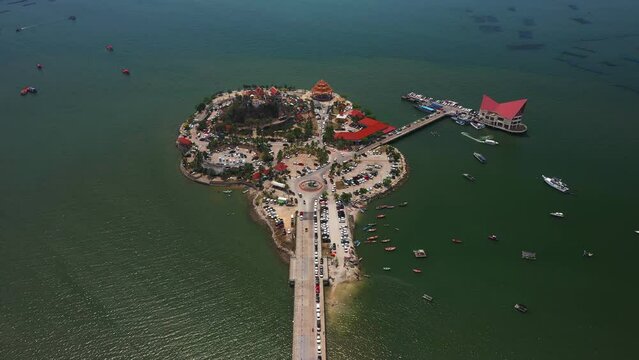 Aerial view of Ko Loi island, Sri Racha with ocean beach or sea, Chonburi skyline, Thailand.