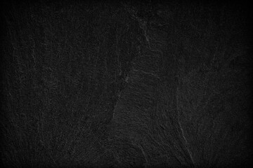 Dark grey black slate background or texture.