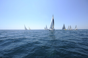 Seascape with sailboat the background of the blue sky.Beautiful sailboat sailing sail blue...