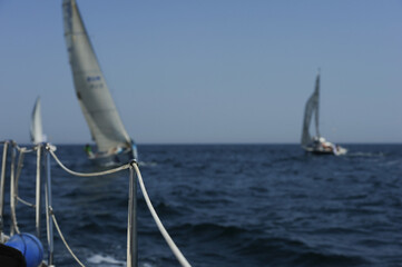 Seascape with sailboat the background of the blue sky.Beautiful sailboat sailing sail blue...