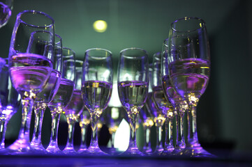 champagne glasses. champagne at a dinner party. detail.