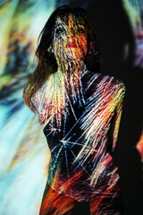 Projection from beamer or projector on woman looks like body painting