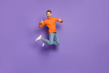 Fototapeta na wymiar Full length photo of good mood energetic sportive man recommend you shopping bargains season isolated on violet color background