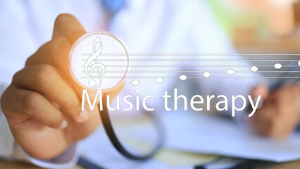 The white-robed doctor used a stethoscope to appear as music therapy as an alternative treatment....