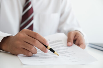 Close up businessman signing contract, partnership agreement, making deal