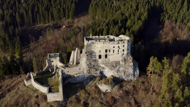 Medieval Abandoned Castle Of Hrad Likava On Mountain Top In Liptov, Slovakia. Aerial Drone Shot
