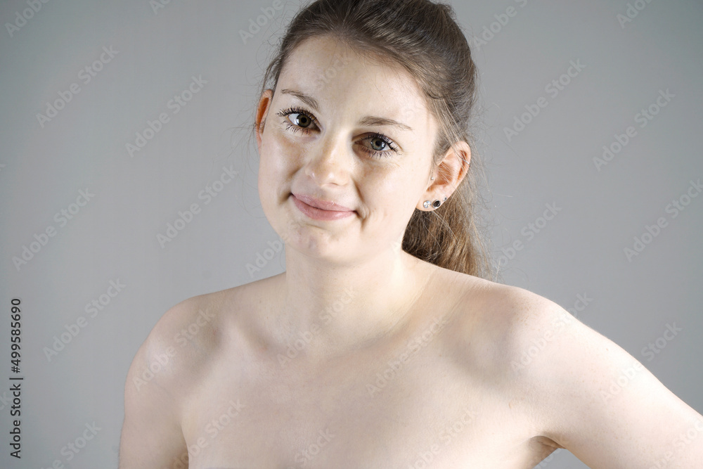 Wall mural portrait of a beautiful young woman in studio