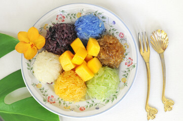 Fresh ripe mango in thai style. Tropical sweet with sticky rice