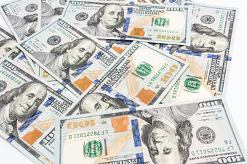 One hundred dollar paper bills of US money banknotes