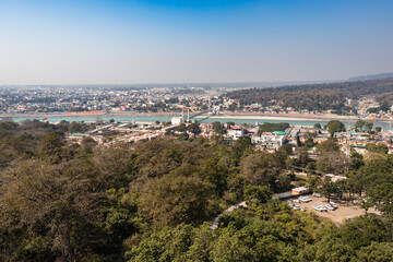 city construction view with river and bridge from mountain top