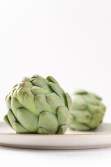 Obraz premium Fresh artichoke on white background