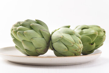 Obraz premium Fresh artichoke on white background