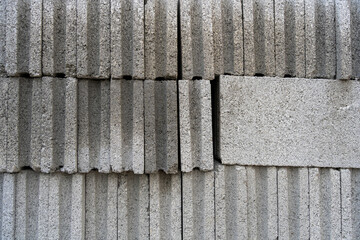 Concrete block wall texture. Grunge seamless wall background. Stacks of concrete blocks