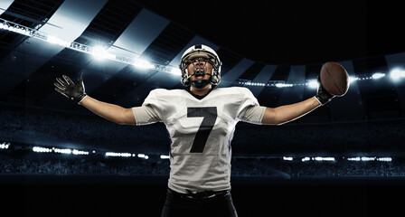 Win, success. Poster with excited american football player in sports equipment holding the ball...