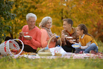 Portrait of family on picnic in autumn
