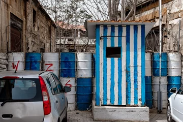 Gordijnen Guard post painted in the colors of Greek flag at The Green Line in Nicosia, Cyprus © kirill_makarov