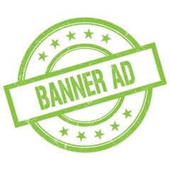 BANNER AD text written on green vintage stamp.