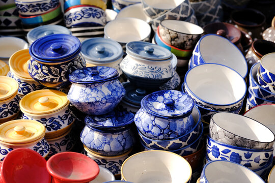 Multicolored Household ceramic items in the Street Market.