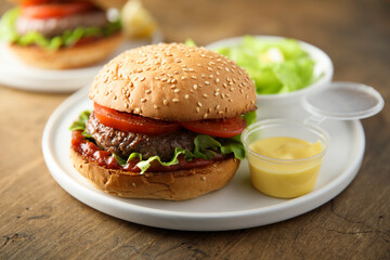 Traditional homemade burger with fresh tomato