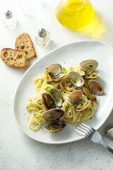Homemade pasta with clams and lemon