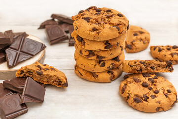 Chocolate cookies on white wooden table. Chocolate chip cookies shot