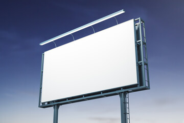Blank white billboard on blue sky background at night, perspective view. Mockup, advertising concept