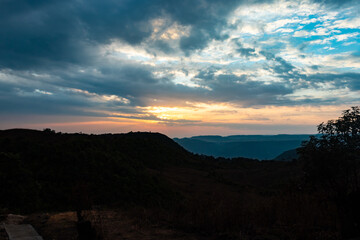 dramatic sunset colorful sky over mountain shadow at morning from flat angle