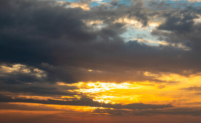dramatic sunset colorful sky over mountain shadow at morning from flat angle