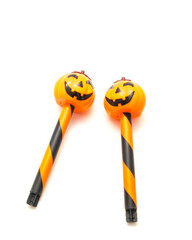 Two Halloween stake light with solar powered Jack O Lantern head garden path walkway light isolated on white