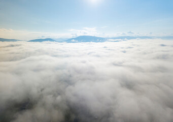 Morning fog in the Ukrainian Carpathians. Aerial drone view.
