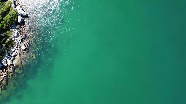 Unbelievable beach with transparent turquoise water, Praia do Forno, Arraial do Cabo, Rio de Janeiro, Brazil - drone aerial view in the middle of nature - caribbean style