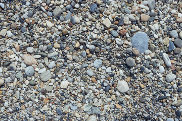 Pebble stone or river stone background with a place for an inscription