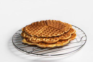 Waffles cooling on a metal rack