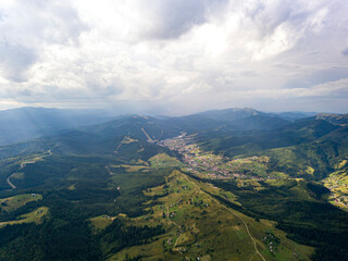 Obraz premium High flight in the mountains of the Ukrainian Carpathians. Aerial drone view.