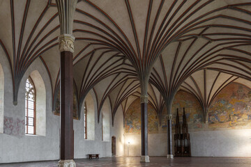 Fototapeta na wymiar Gothic arched vault and columns in a medieval church 