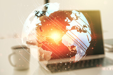 Multi exposure of abstract creative digital world map on laptop background, research and analytics concept