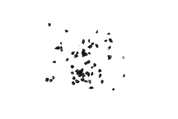 Small fraction of charcoal on a white background.