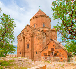 Fototapeta na wymiar Akdamar Island in Van Lake. The Armenian Cathedral Church of the Holy Cross - Akdamar, Turkey