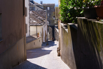 Medieval old town of City of Sion with alley and historic houses on a sunny spring day. Photo taken April 4th, 2022, Sion, Switzerland.