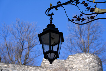 Lantern at the old town of Sion on a sunny spring day. Photo taken April 4th, 2022, Sion, Switzerland.
