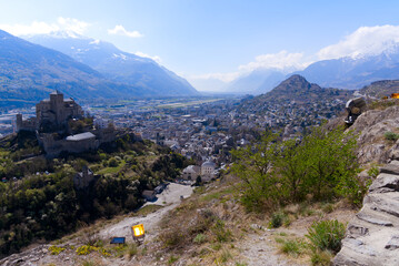 Beautiful medieval catholic church and castle Basilique de Valère (Valeria) on a hill at City of Sion on a sunny spring day. Photo taken April 4th, 2022, Sion, Switzerland.