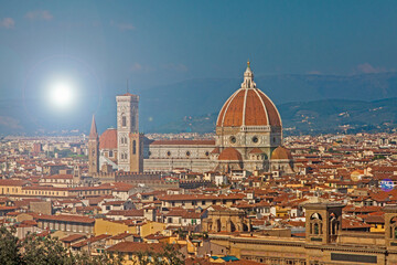 Fototapeta na wymiar Italy - Tuscany - Florence - Panorama of city historical center with Cathedral of Saint Mary of the Flowers (Cattedrale di Santa Maria del Fiore) with sun