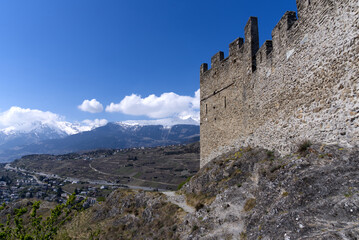 Beautiful ruins of medieval Tourbillon Castle on a hill at City of Sion on a sunny spring day....