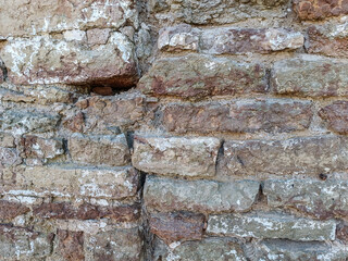 Ancient old vintage brick stone wall background