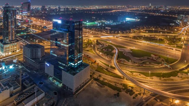 Aerial panoramic view of media city district and highway junction all night timelapse